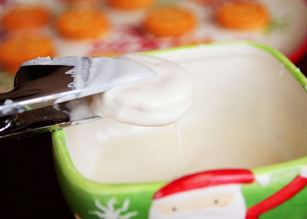 Ritz Cookies — Ritz Crackers stuffed with Peanut Butter dipped in White Chocolate