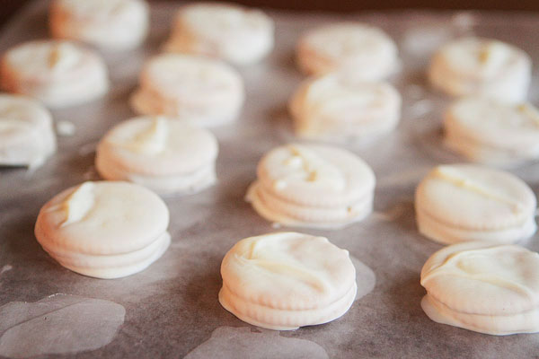 Ritz Cookies — Ritz Crackers stuffed with Peanut Butter dipped in White Chocolate