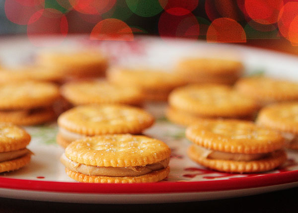 Ritz Cookies — Ritz Crackers stuffed with Peanut Butter dipped in White Chocolate