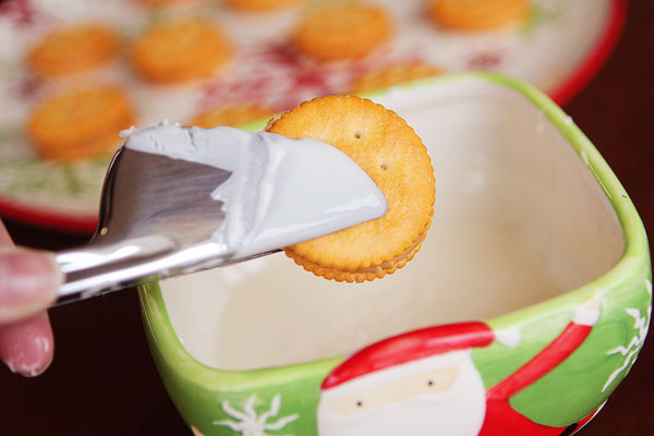 Ritz Cookies — Ritz Crackers stuffed with Peanut Butter dipped in White Chocolate