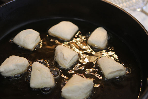 Biscuit Beignets with Praline Sauce