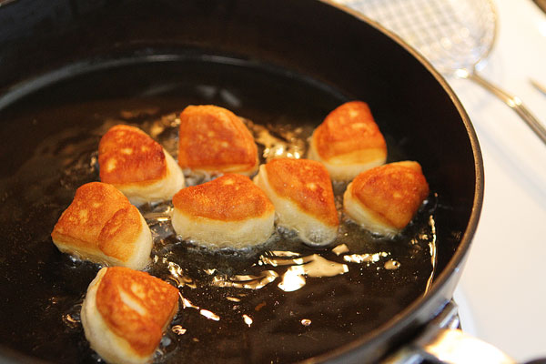 Biscuit Beignets with Praline Sauce