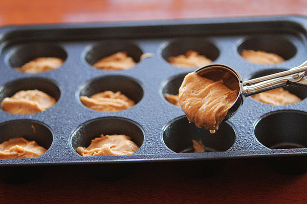 Frosted Candy Bar Stuffed Cookie Cups