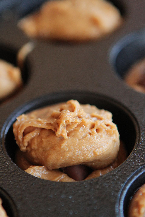 Frosted Candy Bar Stuffed Cookie Cups