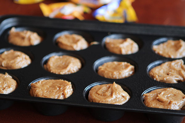 Frosted Candy Bar Stuffed Cookie Cups