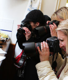 Image of Women Photographing Food