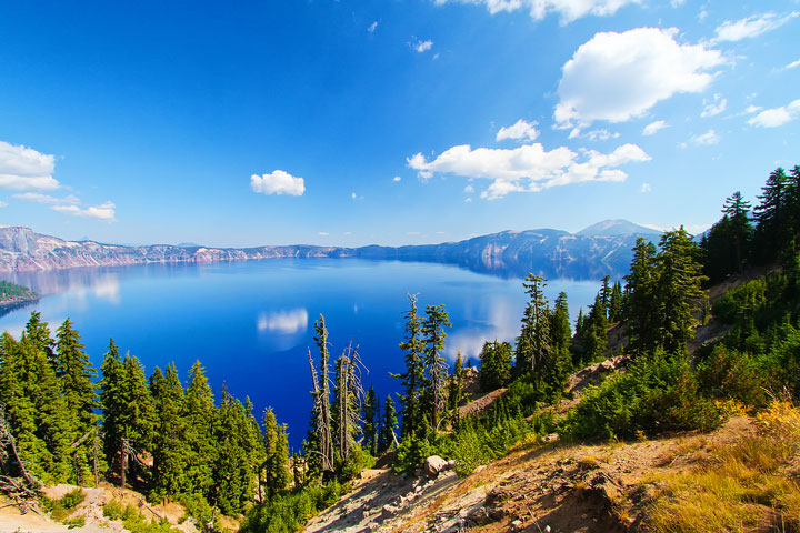 { PHOTOS } Crater Lake, Oregon: Home of the remarkably blue, crystal clear waters of the nation's deepest lake. www.kevinandamanda.com #travel