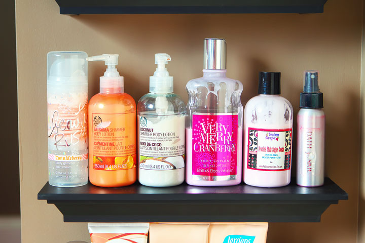 Easy DIY Bathroom Organization! Use crown molding to make shelves to organize perfumes, lotions, hairspray, etc. Neat, organized, and right at your fingertips! From kevinandamanda.com 