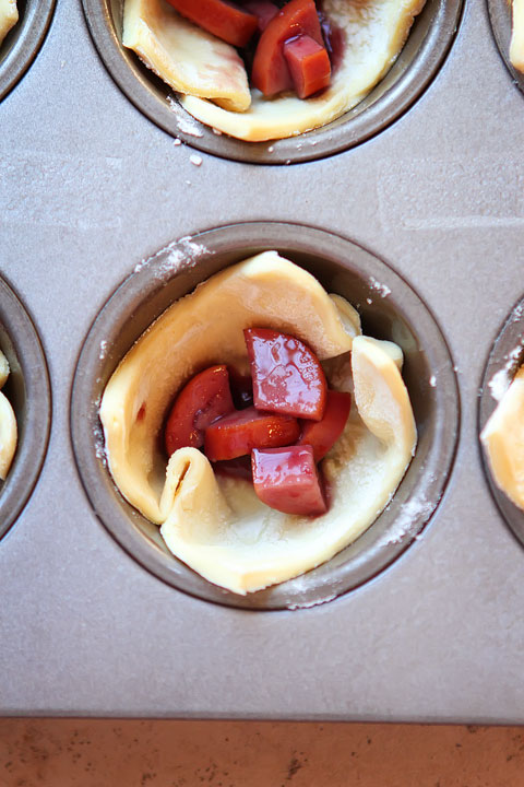Smokey Sausage Cups Appetizer. Like Crockpot Little Smokies + Pigs in a Blanket all wrapped up in one PERFECT bite! kevinandamanda.com