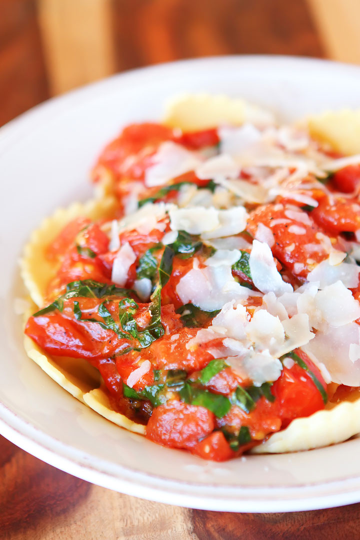 Make your own tomato sauce using only tomatoes, basil, parmesan, butter, salt and pepper. Takes less than 10 mins. Serve over ravioli. LOVE this #recipe!!