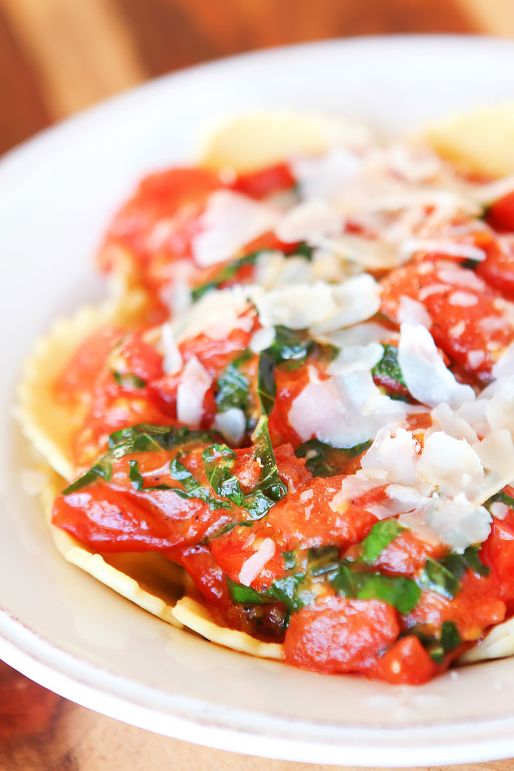 Make your own tomato sauce using only tomatoes, basil, parmesan, butter, salt and pepper. Takes less than 10 mins. Serve over ravioli. LOVE this #recipe!!