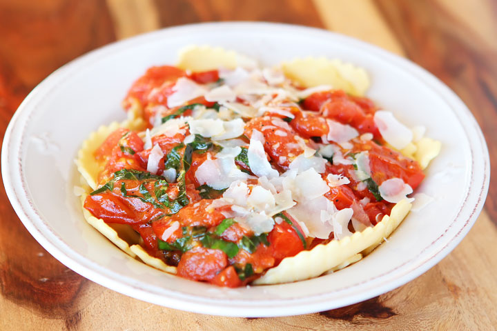 Make your own tomato sauce using only tomatoes, basil, parmesan, butter, salt and pepper. Takes less than 10 mins. Serve over ravioli. LOVE this #recipe!!