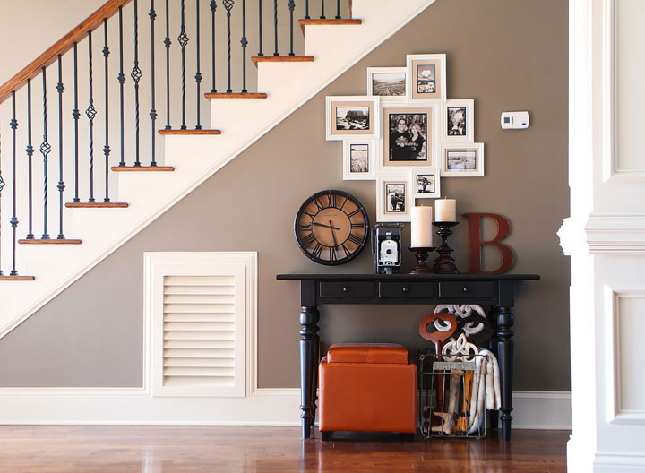 Turn that blank wall under the stairs into a photo gallery wall!