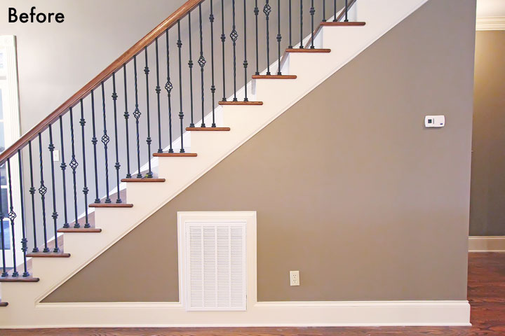 Turn that blank wall under the stairs into a photo gallery wall!