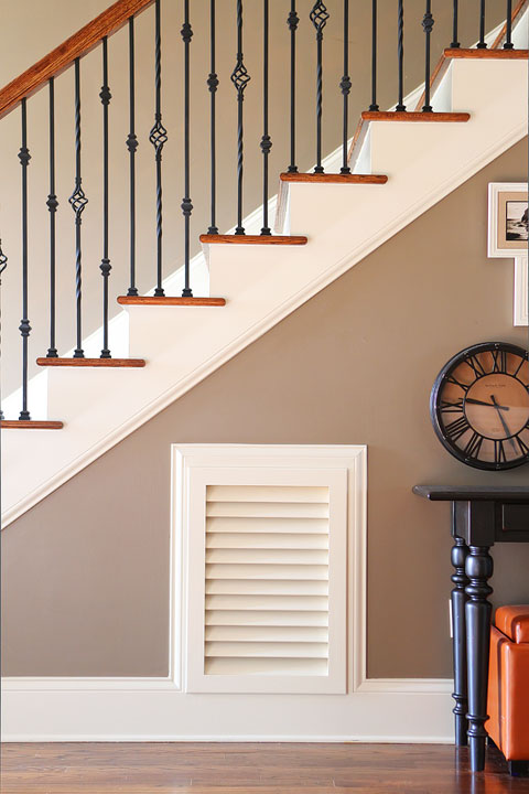 Turn that blank wall under the stairs into a photo gallery wall!