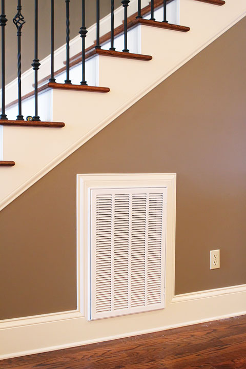 Turn that blank wall under the stairs into a photo gallery wall!