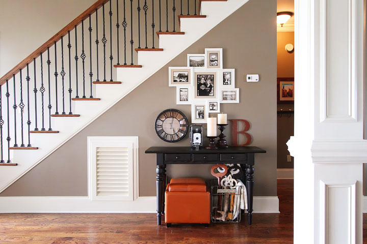 Turn that blank wall under the stairs into a photo gallery wall!