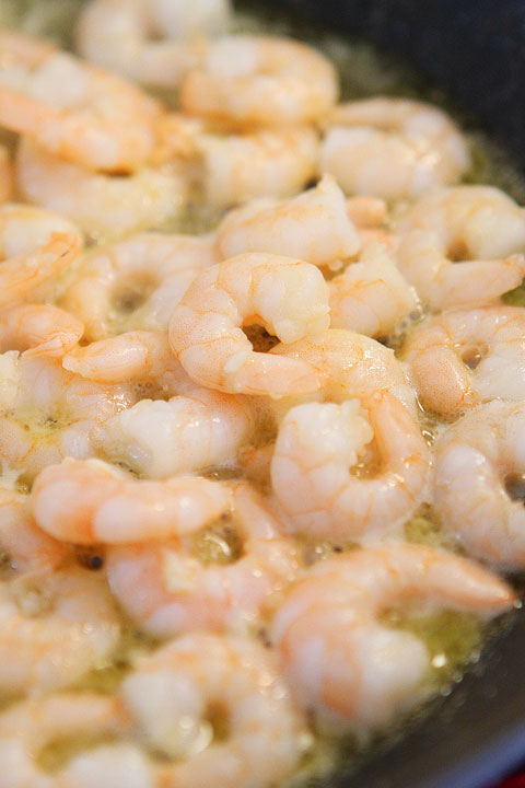 Linguine with shrimp, avocado, & parmesan cheese. Season with salt, pepper, and red pepper flakes. Easy dinner, done!