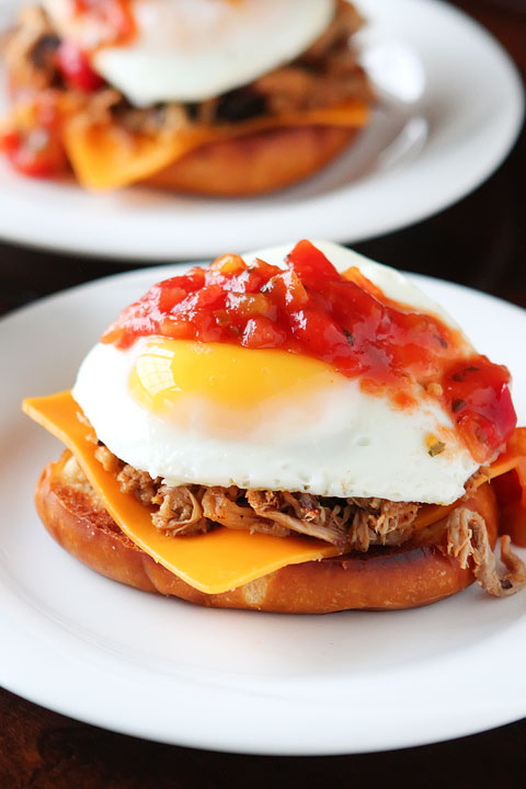All I can say is WOW! Spicy pulled pork topped with a bright mango-peach salsa, a fried egg and served on a fresh pretzel bun.