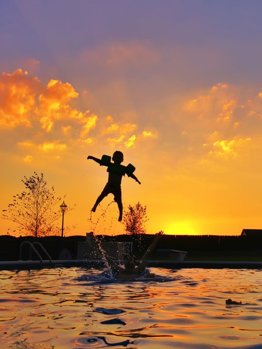 Image of Silhouettes in Front of a Sunset