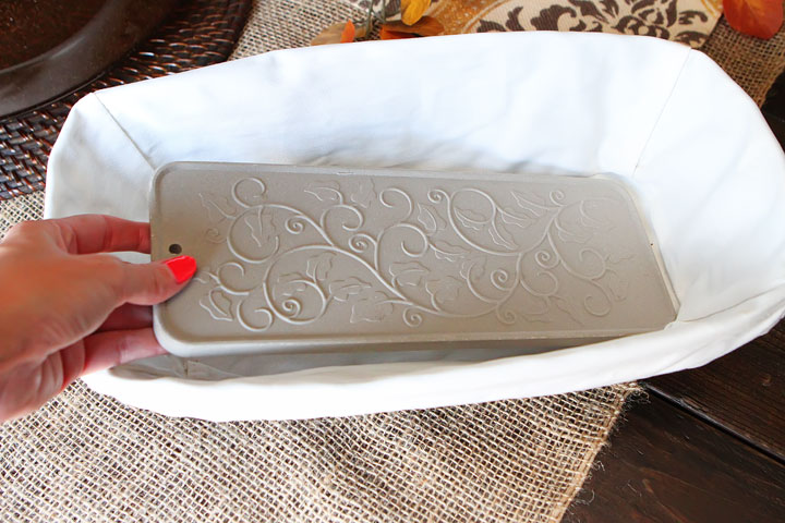 This is brilliant! A gorgeous Wicker Bread Basket with a Warming Stone to keep bread warm after it comes out of the oven. Need this for our Thanksgiving table! Great gift idea too.