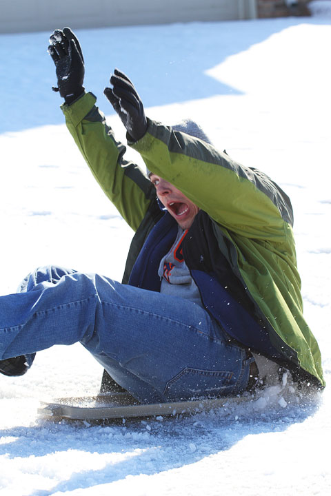 Image of Kevin Almost Falling off His Sled
