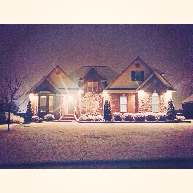 House at night with snow. 