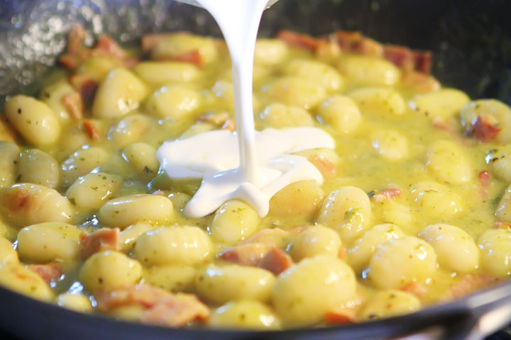 Creamy Pesto Gnocchi with Bacon & Parmesan. This creamy pesto alfredo sauce is incredible!!