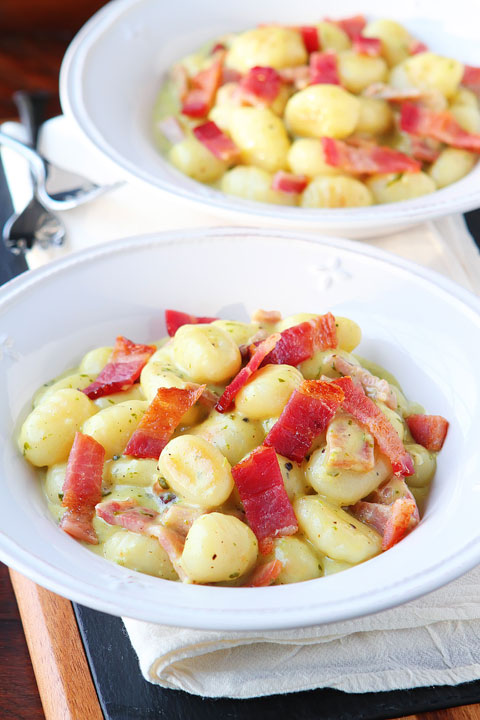 Creamy Pesto Gnocchi with Bacon & Parmesan. This creamy pesto alfredo sauce is incredible!!