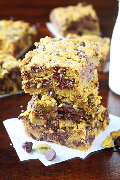 Lucky Leprechaun Bars! So good, they're sure to attract a Leprechaun and his pot of gold. ;) Dark chocolate, pistachio butter, and sea salt come together to make this perfect chewy cookie bar. Make these the next time you need a little luck in your day!