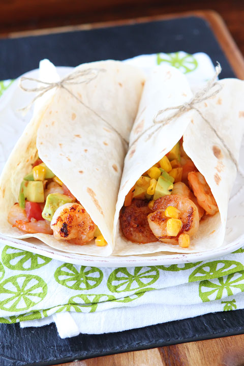 Love these Firecracker Shrimp Tacos with Avocado Corn Salsa. Fresh, spicy, and bursting with flavor! 