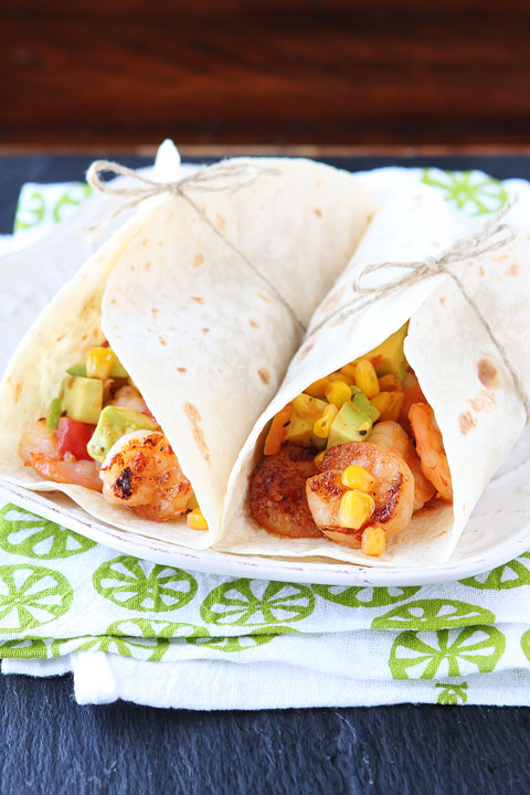 Love these Firecracker Shrimp Tacos with Avocado Corn Salsa. Fresh, spicy, and bursting with flavor! 