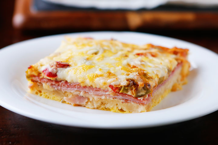 An easy, cheesy, Italian Breakfast Casserole. Layer crescent rolls, ham, salami, eggs, bell peppers and cheese, then bake for 30 mins. Perfect for breakfast, lunch, or breakfast for dinner!