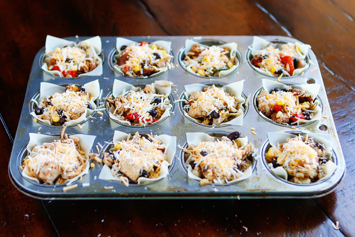 Make these fun Southwestern Chicken Cups using Wonton Wrappers in a Muffin Tin! Great for using up leftover rotisserie chicken or boneless, skinless chicken breasts. 