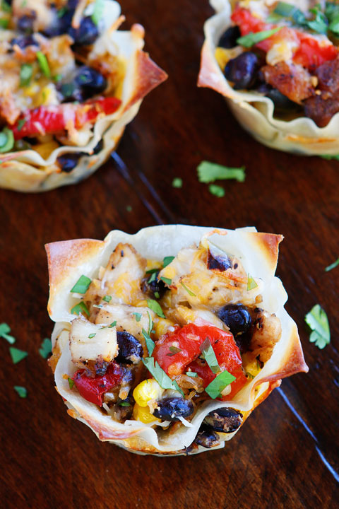 Make these fun Southwestern Chicken Cups using Wonton Wrappers in a Muffin Tin! Great for using up leftover rotisserie chicken or boneless, skinless chicken breasts. 