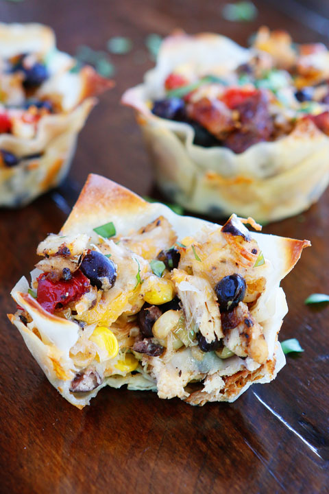 Make these fun Southwestern Chicken Cups using Wonton Wrappers in a Muffin Tin! Great for using up leftover rotisserie chicken or boneless, skinless chicken breasts. 