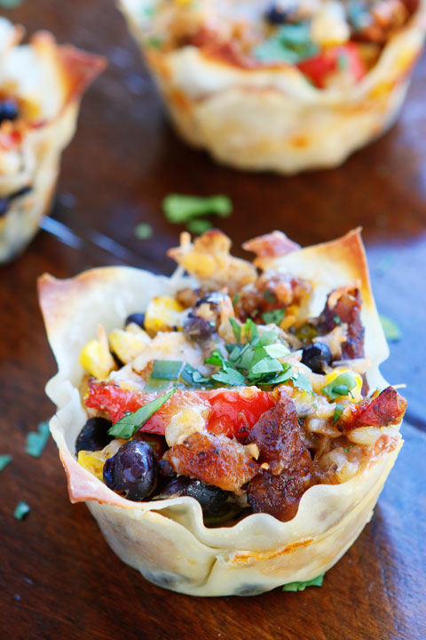 Make these fun Southwestern Chicken Cups using Wonton Wrappers in a Muffin Tin! Great for using up leftover rotisserie chicken or boneless, skinless chicken breasts. 