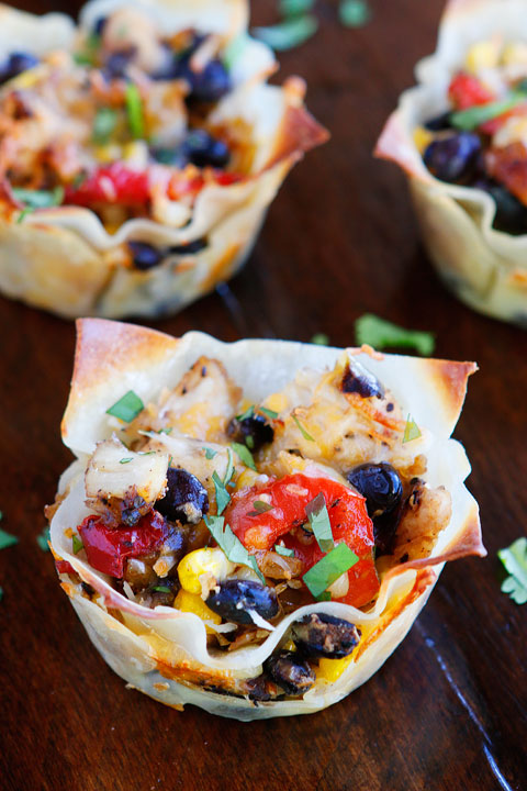 Make these fun Southwestern Chicken Cups using Wonton Wrappers in a Muffin Tin! Great for using up leftover rotisserie chicken or boneless, skinless chicken breasts. 