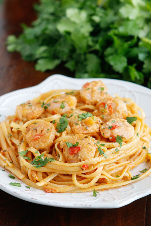 Golden, crunchy shrimp in a zesty Mango-Peach salsa pasta with avocado! Fabulous!!