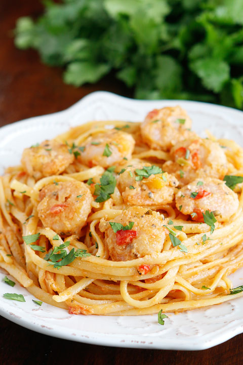 Golden, crunchy shrimp in a zesty Mango-Peach salsa pasta with avocado! Fabulous!!