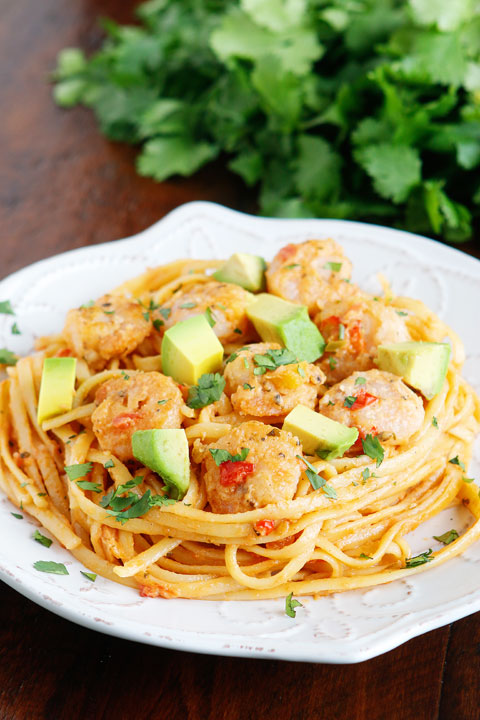 Golden, crunchy shrimp in a zesty Mango-Peach salsa pasta with avocado! Fabulous!!