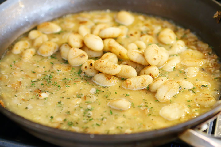 Garlic chicken and toasted potato gnocchi in a rosemary lemon cream sauce. Great for easy weeknight dinners AND impressing guests. Will make this one again!