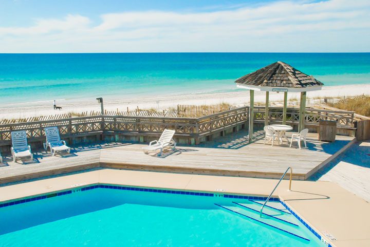 Pet-friendly dog beach and condo rentals on the Florida Panhandle! Pristine white-sand beaches with crystal-clear turquoise water. Perfect for the whole family!