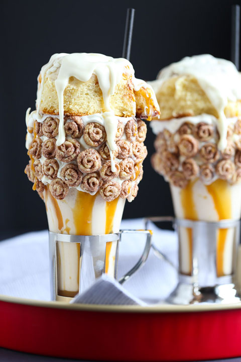 Cinnamon Roll Milkshake! Crazy milkshakes are all the hype in NYC, London, and Australia. Now you can skip the flight and 3-4 hour wait in line and make them right at home!! Such a fun idea for a party. MUST try this!!