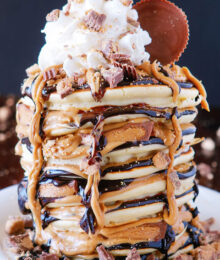 Image of a stack of Chocolate Peanut Butter Cup Pancakes