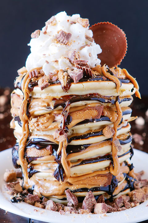 OMG These Reese's Chocolate Peanut Butter Cup Pancakes are UNREAL!!! Love this giant stack of pancakes!!