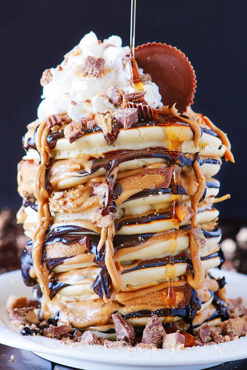 OMG These Reese's Chocolate Peanut Butter Cup Pancakes are UNREAL!!! Love this giant stack of pancakes!!