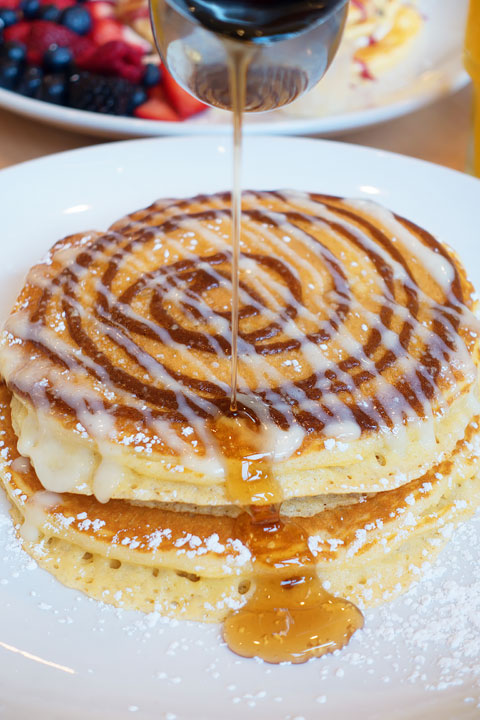 Image of a Cinnamon Bun Pancake from Snooze AM Eatery