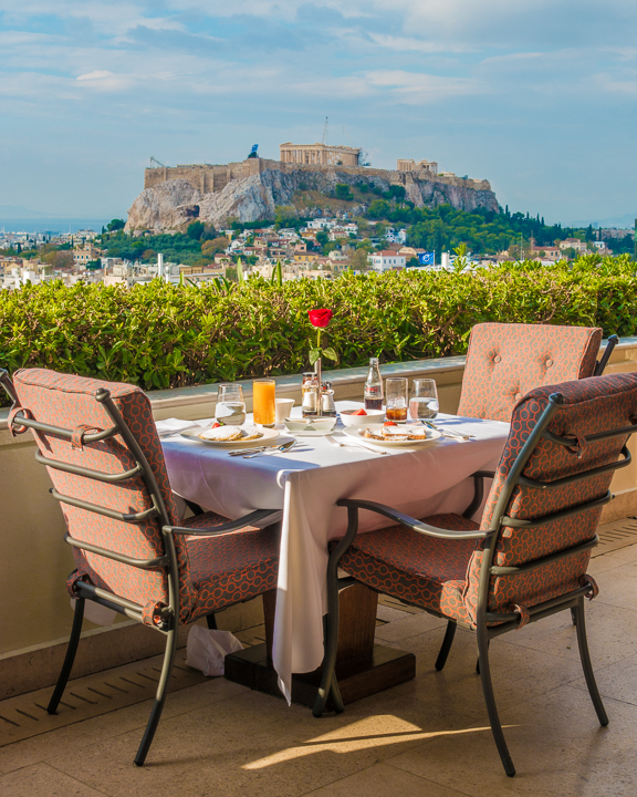 Breakfast view of Acropolis in Athens Greece