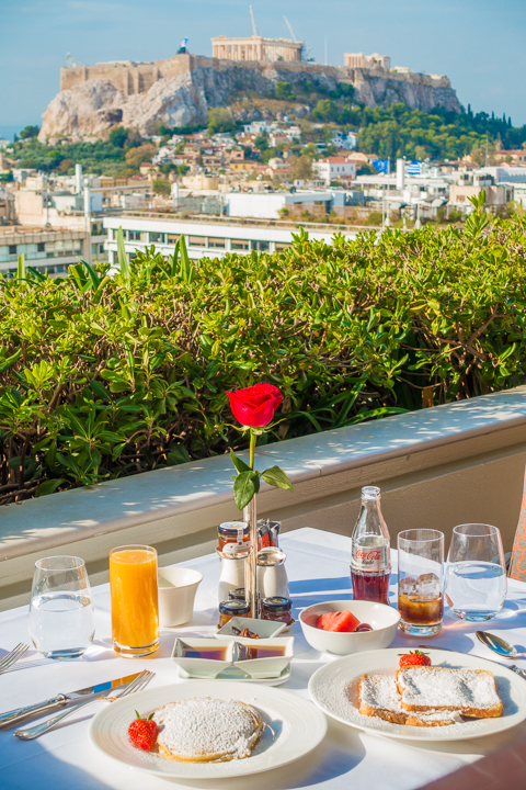 Breakfast view of Acropolis in Athens Greece